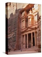 Tourist Looking Up at the Facade of the Treasury (Al Khazneh) Carved into the Red Rock at Petra, UN-Martin Child-Stretched Canvas