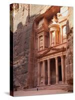 Tourist Looking Up at the Facade of the Treasury (Al Khazneh) Carved into the Red Rock at Petra, UN-Martin Child-Stretched Canvas