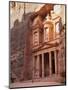 Tourist Looking Up at the Facade of the Treasury (Al Khazneh) Carved into the Red Rock at Petra, UN-Martin Child-Mounted Photographic Print