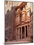 Tourist Looking Up at the Facade of the Treasury (Al Khazneh) Carved into the Red Rock at Petra, UN-Martin Child-Mounted Photographic Print