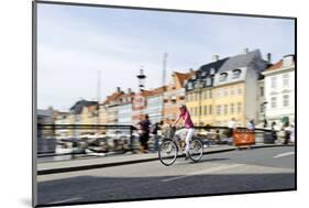 Tourist on Bicycle, Entertainment District, Nyhavn, Copenhagen, Scandinavia-Axel Schmies-Mounted Photographic Print