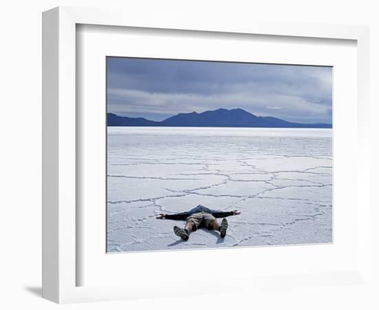 Tourist on Salt Crust of Salar De Uyuni, Emphasising Scale of Largest Salt Flat in World, Bolivia-John Warburton-lee-Framed Photographic Print