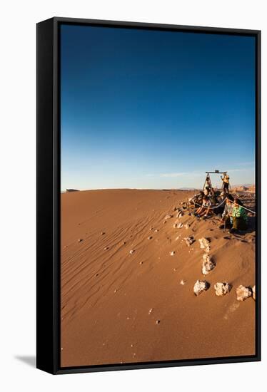 Tourist on sand dune, Valle De La Luna, Atacama Desert, San Pedro de Atacama, El Loa Province, A...-null-Framed Stretched Canvas