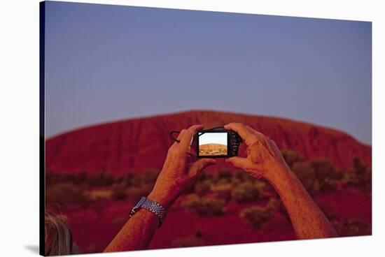 Tourist Photographing Ayers Rock in the Australian Outback-Paul Souders-Stretched Canvas