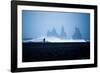 Tourist running on Black Sand Beach, Iceland, Polar Regions-John Alexander-Framed Photographic Print