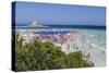 Tourists and beach umbrellas at La Pelosa Beach, Stintino, Asinara Nat'l Park, Sardinia, Italy-Roberto Moiola-Stretched Canvas