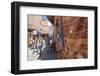 Tourists and Locals Walking Alongside Traditional Rugs in the Medina's Souks-Charlie Harding-Framed Photographic Print