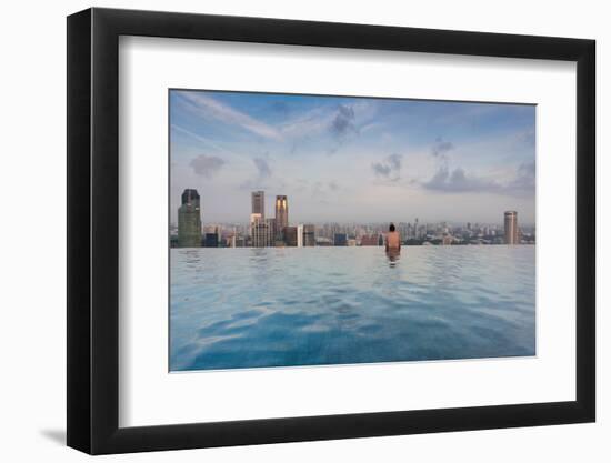 Tourists at infinity pool of Marina Bay Sands Hotel, Marina Bay, Singapore-null-Framed Photographic Print