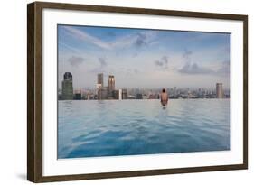 Tourists at infinity pool of Marina Bay Sands Hotel, Marina Bay, Singapore-null-Framed Photographic Print