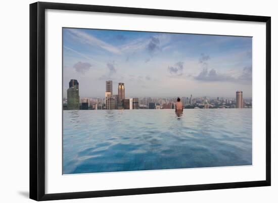 Tourists at infinity pool of Marina Bay Sands Hotel, Marina Bay, Singapore-null-Framed Photographic Print