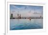 Tourists at infinity pool of Marina Bay Sands Hotel, Marina Bay, Singapore-null-Framed Photographic Print