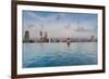 Tourists at infinity pool of Marina Bay Sands Hotel, Marina Bay, Singapore-null-Framed Photographic Print