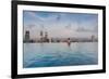 Tourists at infinity pool of Marina Bay Sands Hotel, Marina Bay, Singapore-null-Framed Photographic Print