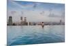 Tourists at infinity pool of Marina Bay Sands Hotel, Marina Bay, Singapore-null-Mounted Photographic Print