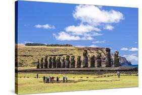 Tourists at the 15 Moai Restored Ceremonial Site of Ahu Tongariki-Michael Nolan-Stretched Canvas