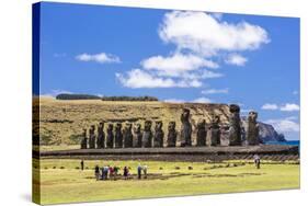 Tourists at the 15 Moai Restored Ceremonial Site of Ahu Tongariki-Michael Nolan-Stretched Canvas