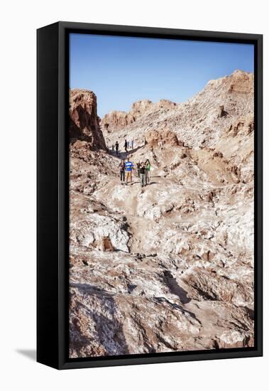Tourists Climbing over the Top of Chulacao Caves, Moon Valley, Atacama Desert-Kimberly Walker-Framed Stretched Canvas