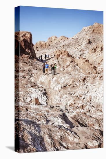 Tourists Climbing over the Top of Chulacao Caves, Moon Valley, Atacama Desert-Kimberly Walker-Stretched Canvas