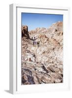 Tourists Climbing over the Top of Chulacao Caves, Moon Valley, Atacama Desert-Kimberly Walker-Framed Photographic Print