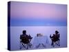 Tourists Enjoy Sundowners While Looking Out across the Endless Salt Crust of Salar De Uyuni-John Warburton-lee-Stretched Canvas