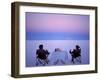 Tourists Enjoy Sundowners While Looking Out across the Endless Salt Crust of Salar De Uyuni-John Warburton-lee-Framed Photographic Print