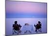 Tourists Enjoy Sundowners While Looking Out across the Endless Salt Crust of Salar De Uyuni-John Warburton-lee-Mounted Photographic Print