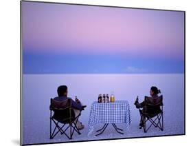 Tourists Enjoy Sundowners While Looking Out across the Endless Salt Crust of Salar De Uyuni-John Warburton-lee-Mounted Photographic Print