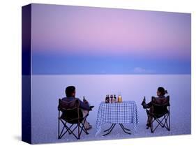 Tourists Enjoy Sundowners While Looking Out across the Endless Salt Crust of Salar De Uyuni-John Warburton-lee-Stretched Canvas