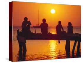 Tourists Enjoying the Sunset, Roatan, Largest of the Bay Islands, Honduras, Caribbean Sea-Robert Francis-Stretched Canvas