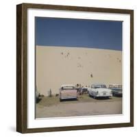 Tourists in Bathing Suits by Parked Cars and Climbing the Sleeping Bear Sand Dunes, Michigan, 1961-Frank Scherschel-Framed Photographic Print