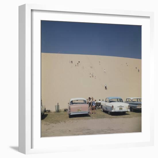 Tourists in Bathing Suits by Parked Cars and Climbing the Sleeping Bear Sand Dunes, Michigan, 1961-Frank Scherschel-Framed Photographic Print