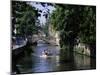 Tourists in Boat on Canal, Bruges, Belgium-Peter Scholey-Mounted Photographic Print