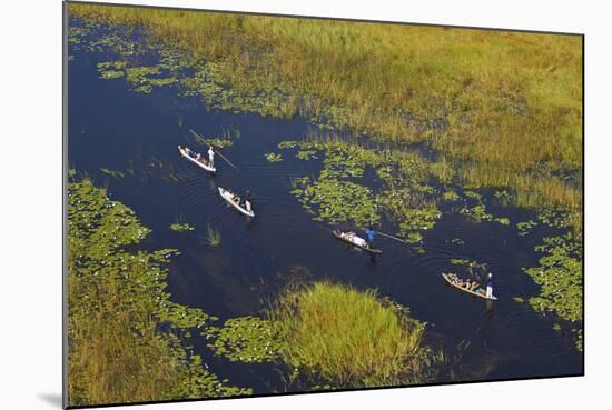 Tourists in mekoro, Okavango Delta, Botswana-David Wall-Mounted Photographic Print