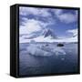 Tourists in Rigid Inflatable Boat Approach a Seal Lying on the Ice, Antarctica-Geoff Renner-Framed Stretched Canvas