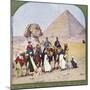Tourists on Camels at Gizeh, the Sphinx and a Pyramid Behind Them-null-Mounted Photographic Print