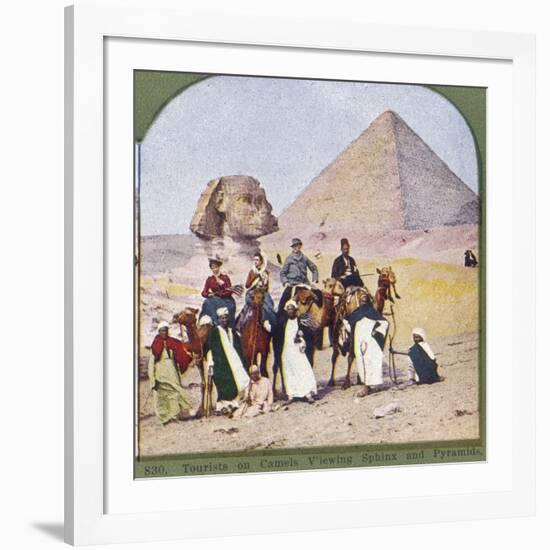 Tourists on Camels at Gizeh, the Sphinx and a Pyramid Behind Them-null-Framed Photographic Print