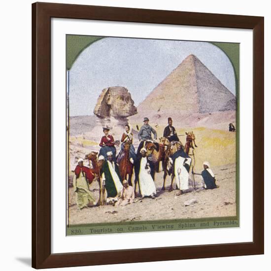 Tourists on Camels at Gizeh, the Sphinx and a Pyramid Behind Them-null-Framed Photographic Print