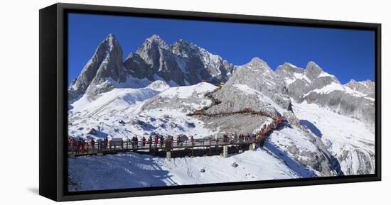 Tourists on Jade Dragon Snow Mountain (Yulong Xueshan), Lijiang, Yunnan, China-Ian Trower-Framed Stretched Canvas