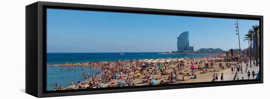 Tourists on the Beach with W Barcelona Hotel in the Background, Barceloneta Beach, Barcelona-null-Framed Stretched Canvas