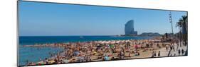 Tourists on the Beach with W Barcelona Hotel in the Background, Barceloneta Beach, Barcelona-null-Mounted Photographic Print