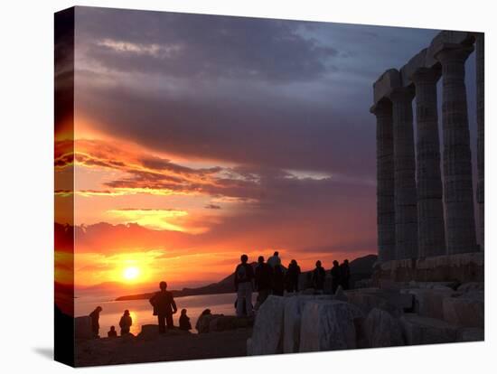 Tourists Stand Outside the Temple of Poseidon at Cape Sounion-null-Stretched Canvas