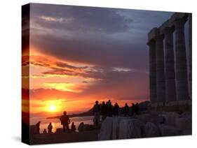 Tourists Stand Outside the Temple of Poseidon at Cape Sounion-null-Stretched Canvas