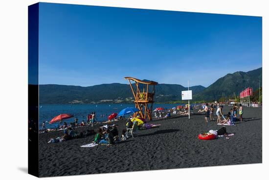 Tourists Sunbathing on the Volcanic Sand Beach on Lago Villarrica, Pucon, Chile, South America-Michael Runkel-Stretched Canvas
