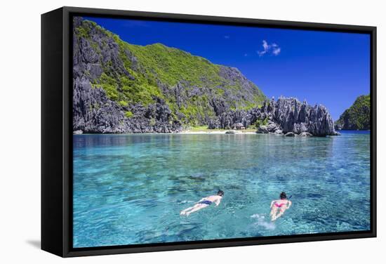 Tourists Swimming in the Crystal Clear Water in the Bacuit Archipelago, Palawan, Philippines-Michael Runkel-Framed Stretched Canvas