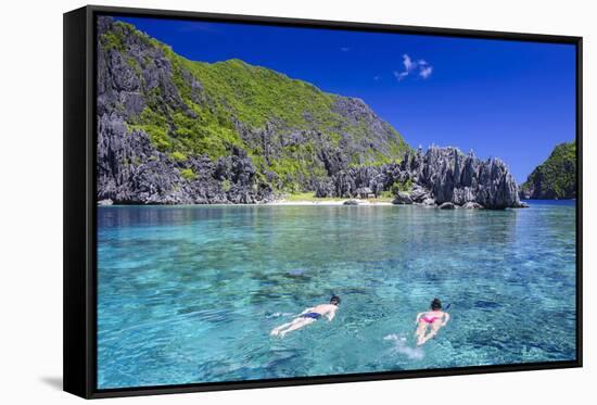 Tourists Swimming in the Crystal Clear Water in the Bacuit Archipelago, Palawan, Philippines-Michael Runkel-Framed Stretched Canvas