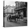 Tourists Take in the Scenery Via Horse-Drawn Carriage on Royal Street in New Orleans-null-Stretched Canvas