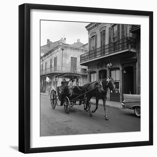 Tourists Take in the Scenery Via Horse-Drawn Carriage on Royal Street in New Orleans-null-Framed Photographic Print