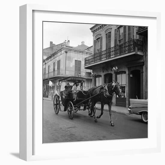 Tourists Take in the Scenery Via Horse-Drawn Carriage on Royal Street in New Orleans-null-Framed Photographic Print