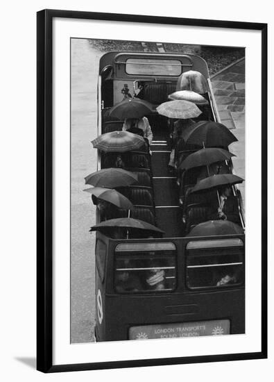 Tourists under Umbrellas on Open Top Bus, 1976-Kent Gavin-Framed Photographic Print