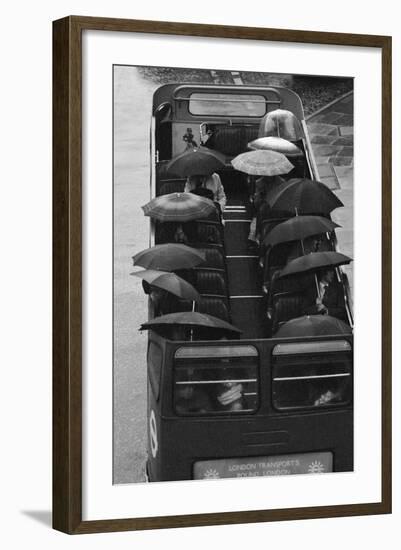 Tourists under Umbrellas on Open Top Bus, 1976-Kent Gavin-Framed Photographic Print